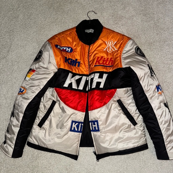 Kith Black and Orange Puffer Jacket